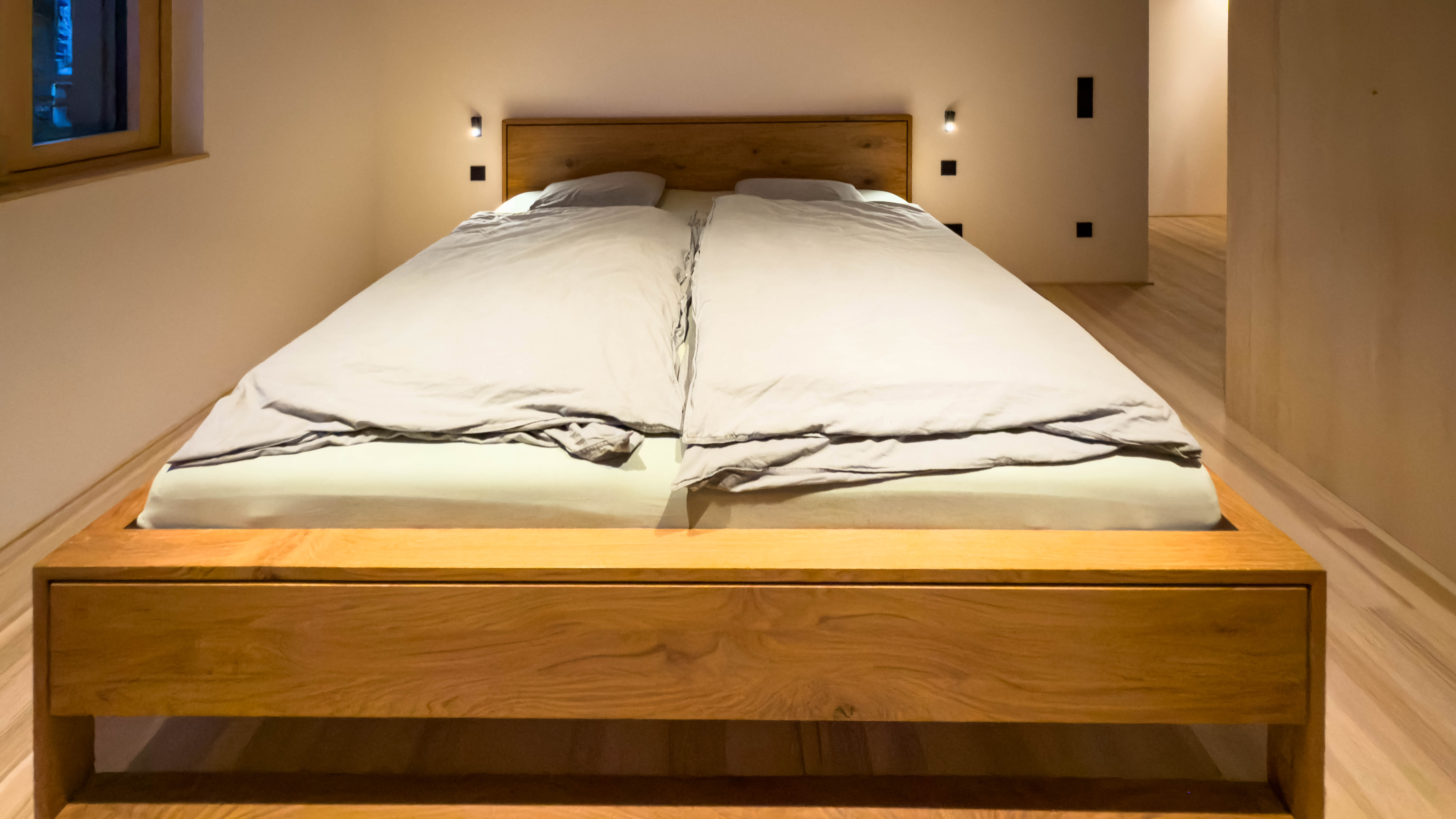 Beleuchtung Schlafzimmer mit Wandleuchten. Referenz Ulmer